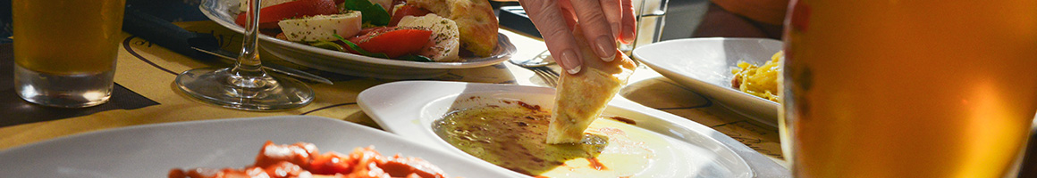 Eating Greek Mediterranean Southern at Zoës Kitchen restaurant in Charlottesville, VA.
